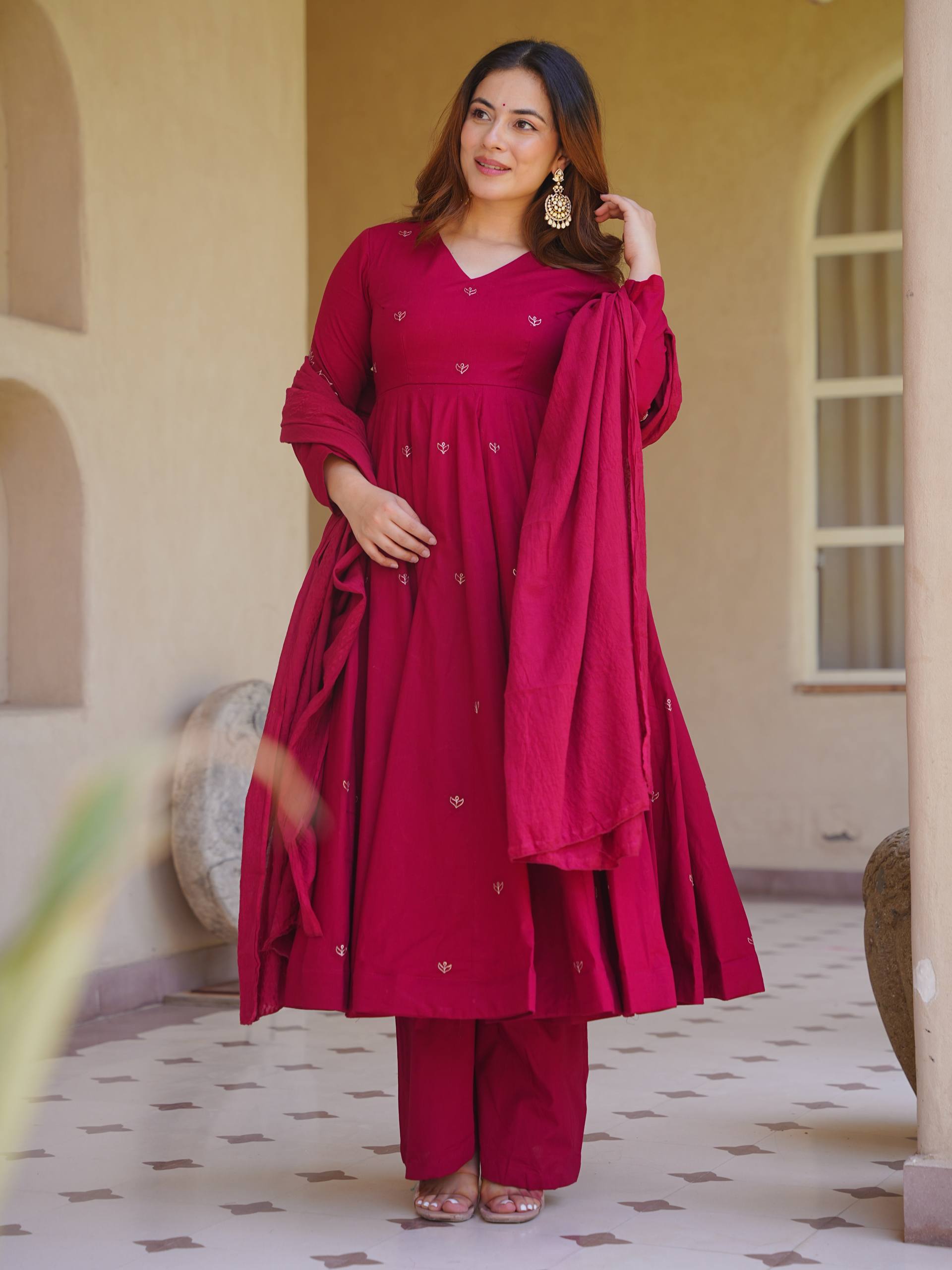 Rich Magenta Maroon Flared Anarkali Suit Set Adorned with Delicate Scattered Floral Embroidery and an Elegant V-Neckline